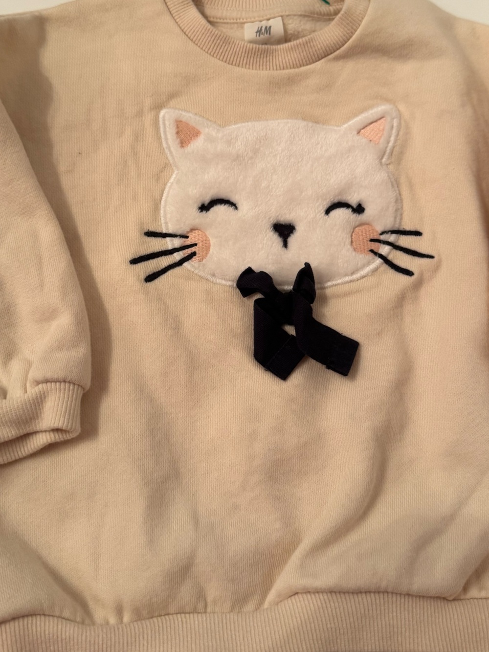 H&M Cream Baby Sweatshirt with Kitty Appliqué and Black Bow